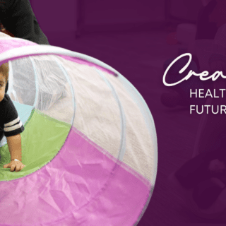 A young participant in upSTART Community Programs crawls through a playroom tunnel, smiling. Text reads: Creating Healthier Futures